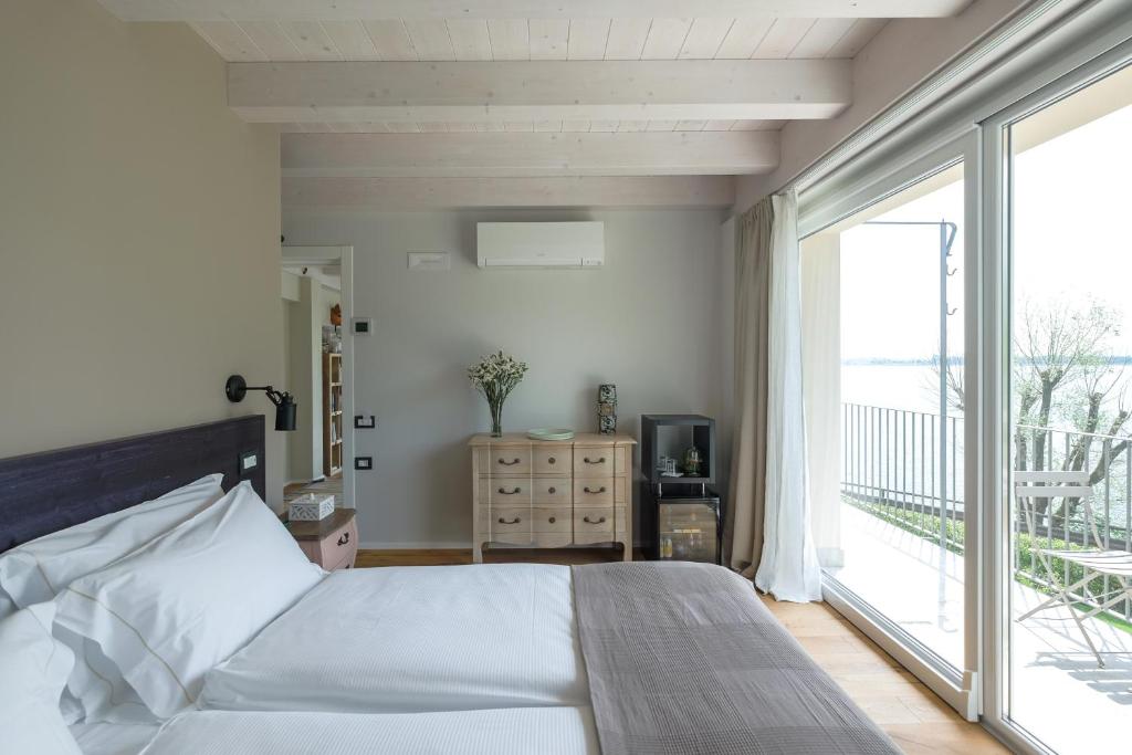 Postel nebo postele na pokoji v ubytování Casa della Capra
