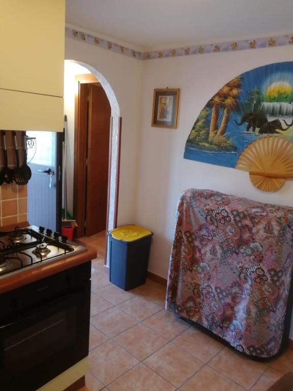 Kuchyň nebo kuchyňský kout v ubytování Casa- Vacanza Giro' - C2A6PEU3OW