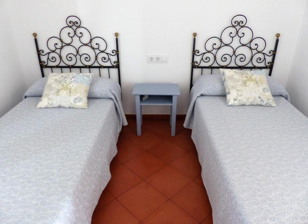 A bed or beds in a room at Agroturismo Son Triay