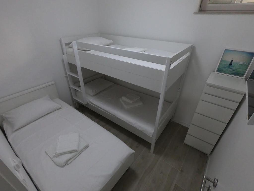 Postel nebo postele na pokoji v ubytování Apartman Matej -Selce