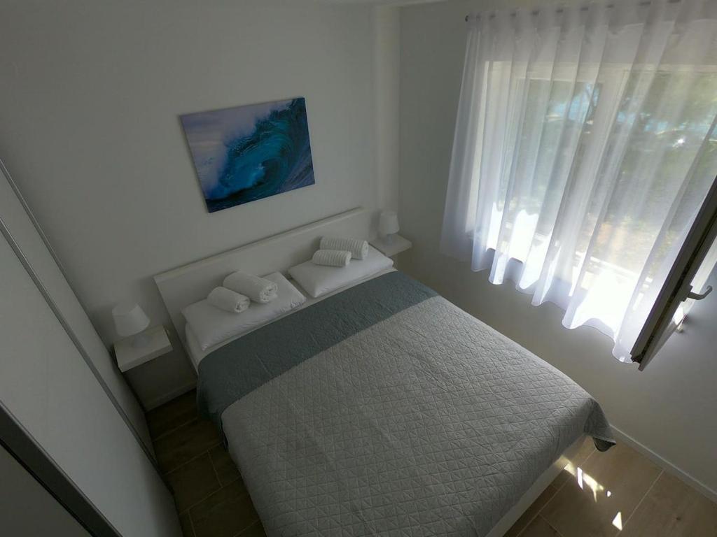 Postel nebo postele na pokoji v ubytování Apartman Matej -Selce