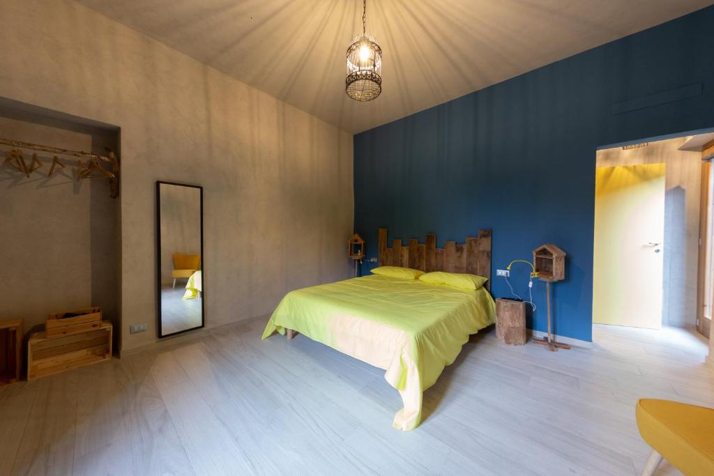 En eller flere senge i et værelse på La Pitta