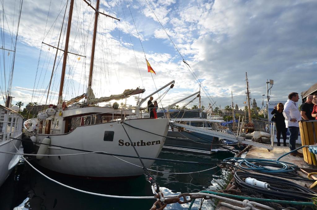 a group of people standing on a boat in the water at Southern Cross in Barcelona