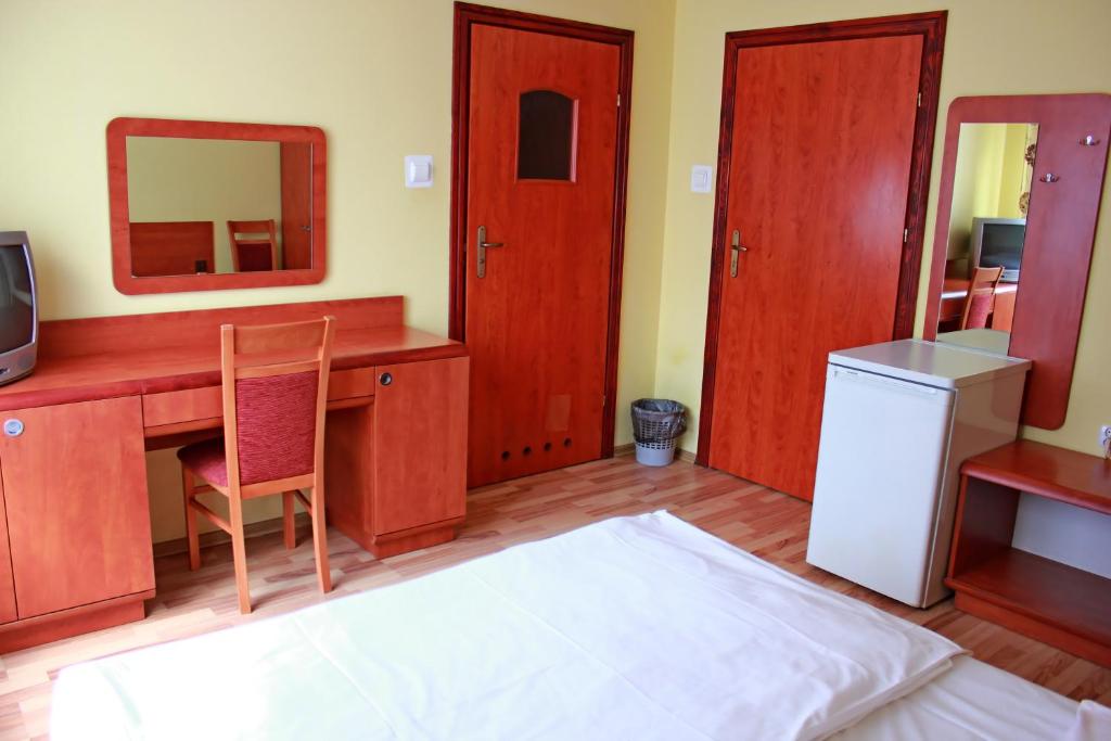 Postel nebo postele na pokoji v ubytování City Hostel