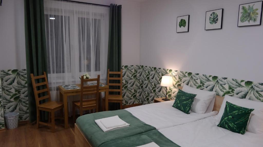 Postel nebo postele na pokoji v ubytování Villa Magnolia