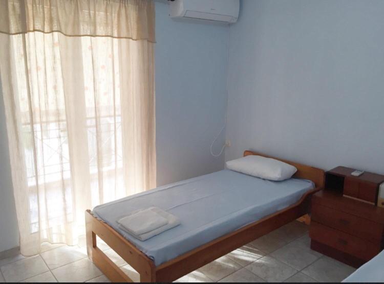 Postel nebo postele na pokoji v ubytování Nonika’s House
