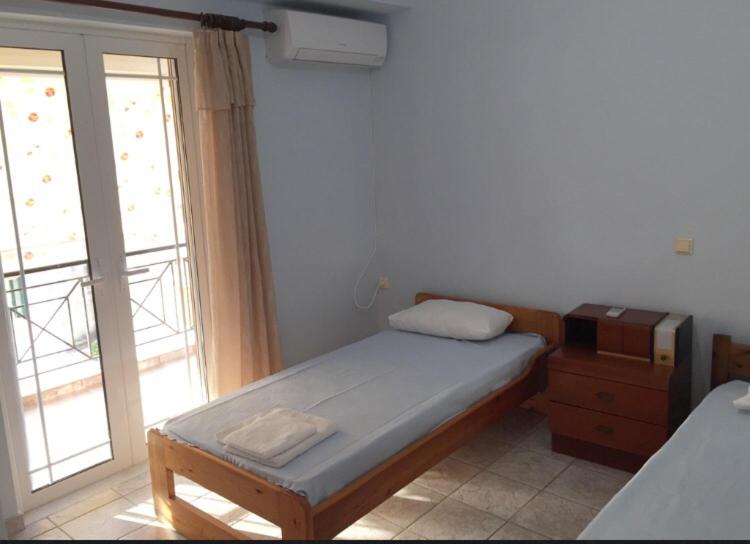 Postel nebo postele na pokoji v ubytování Nonika’s House