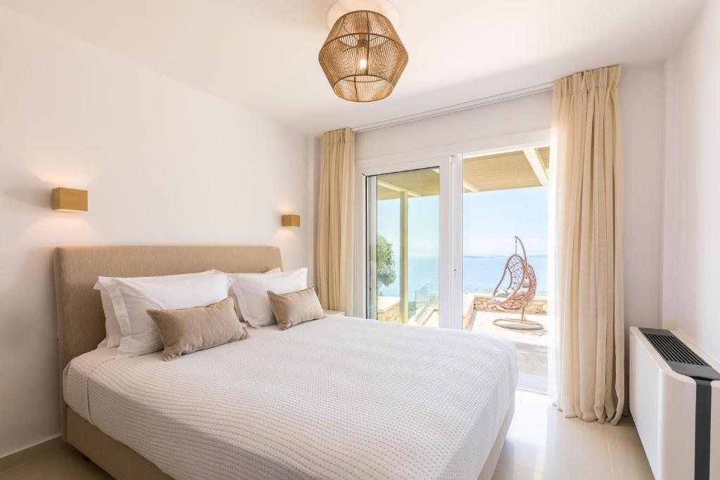 Postel nebo postele na pokoji v ubytování Bolla D'Oro Luxury Villas