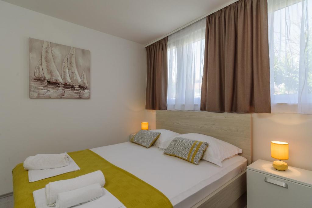 En eller flere senge i et værelse på **Stone House ** Trogir Center ** Old Town