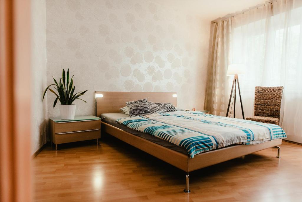 En eller flere senge i et værelse på Old Town Apartment Pellicova