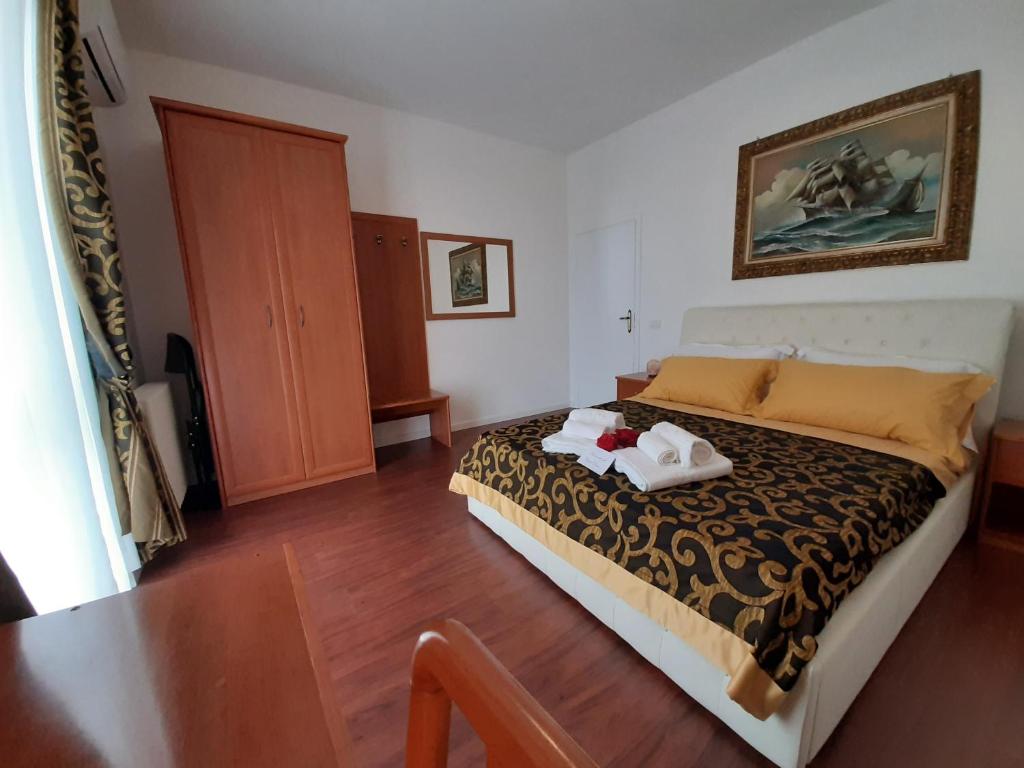 Voodi või voodid majutusasutuse Carpe Diem Ancona toas