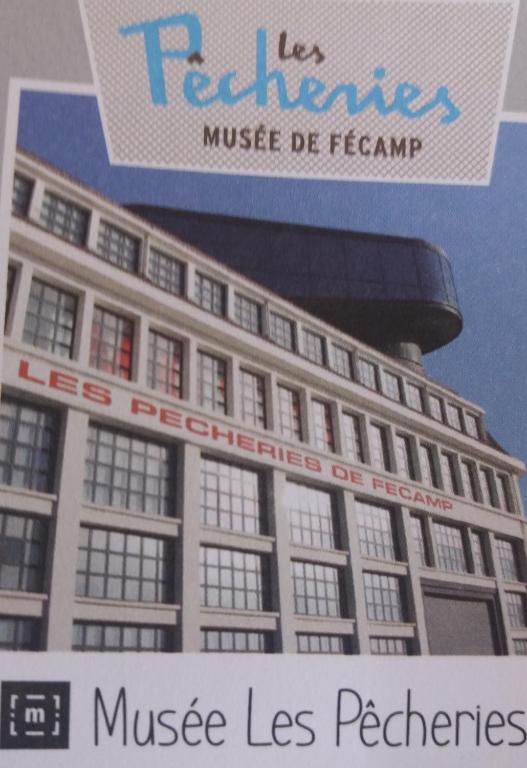 a picture of a building with a sign in front of it at L' ALBATROS vue sur le port in Fécamp