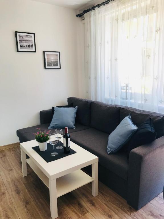 Posedenie v ubytovaní Karwia Pokoje & Apartamenty