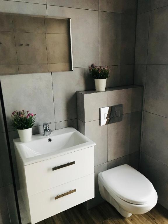 Kúpeľňa v ubytovaní Karwia Pokoje & Apartamenty