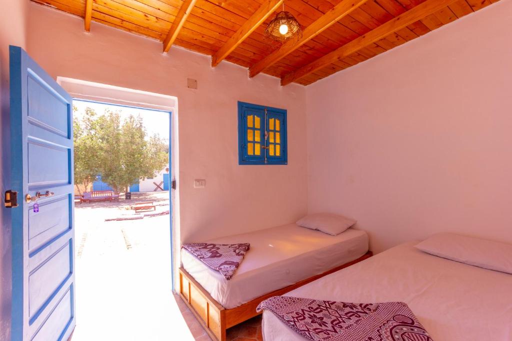 Postel nebo postele na pokoji v ubytování Elrayga Camp Dahab
