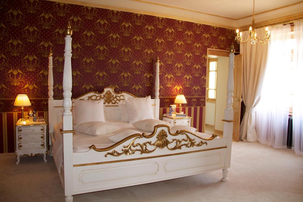 Postel nebo postele na pokoji v ubytování Château de Béguin
