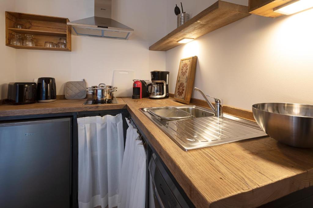 Kuchyň nebo kuchyňský kout v ubytování Sunset Residence
