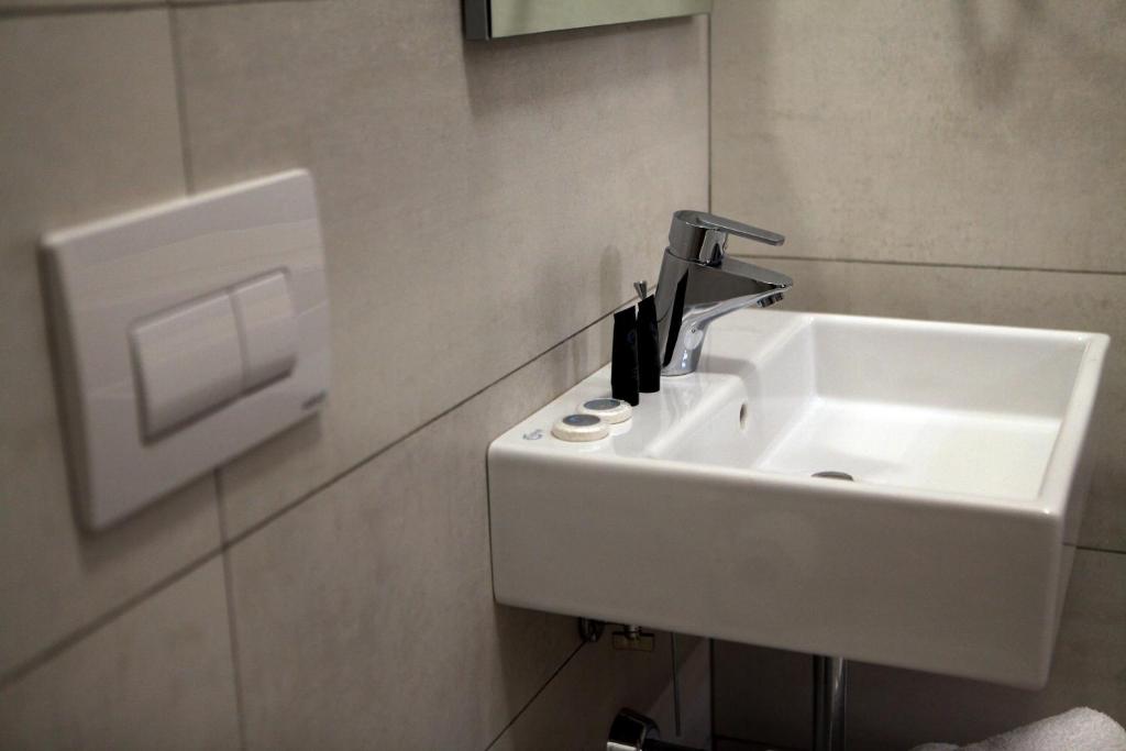 Koupelna v ubytování Hotel Pelikan
