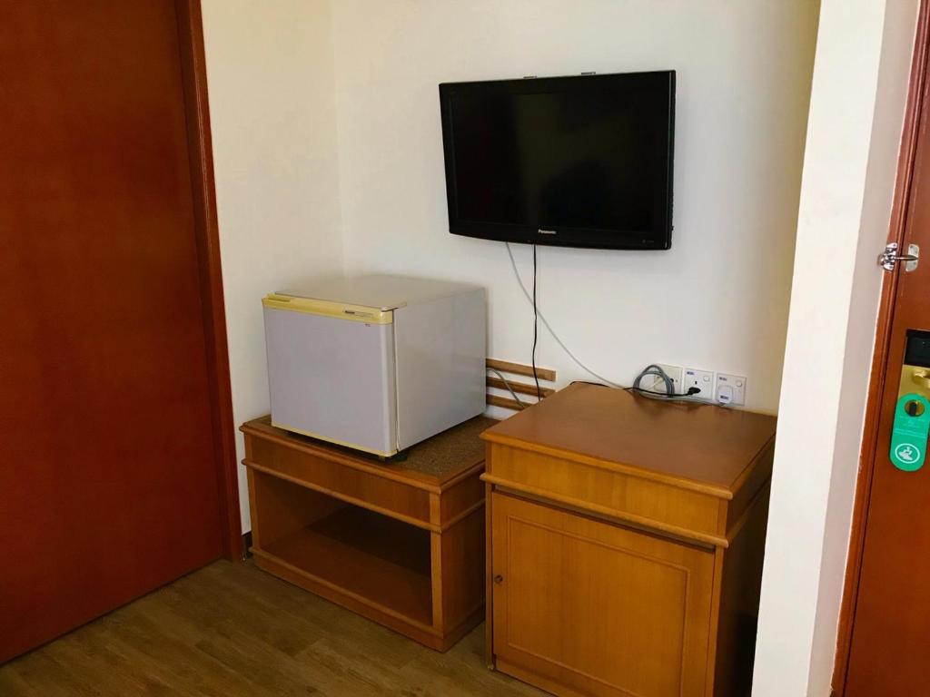 TV a/nebo společenská místnost v ubytování The Executive Hotel Lahad Datu