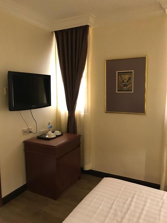 TV a/nebo společenská místnost v ubytování The Executive Hotel Lahad Datu