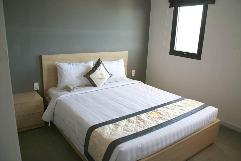 Postel nebo postele na pokoji v ubytování Summering Hotel