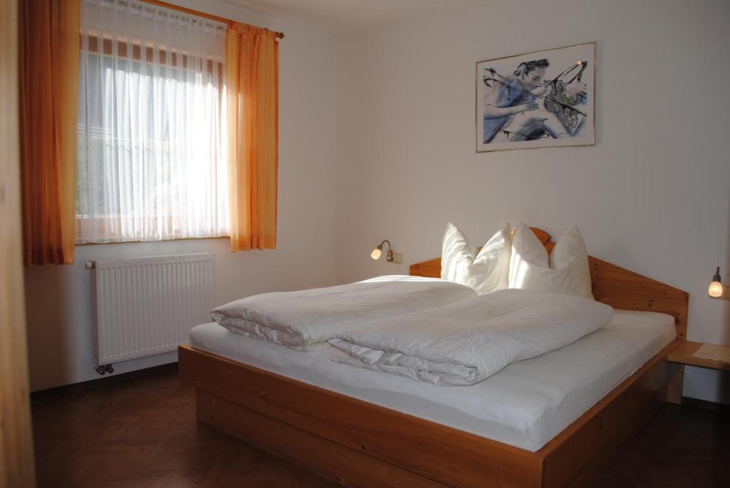 Postel nebo postele na pokoji v ubytování Apartment Maierhof