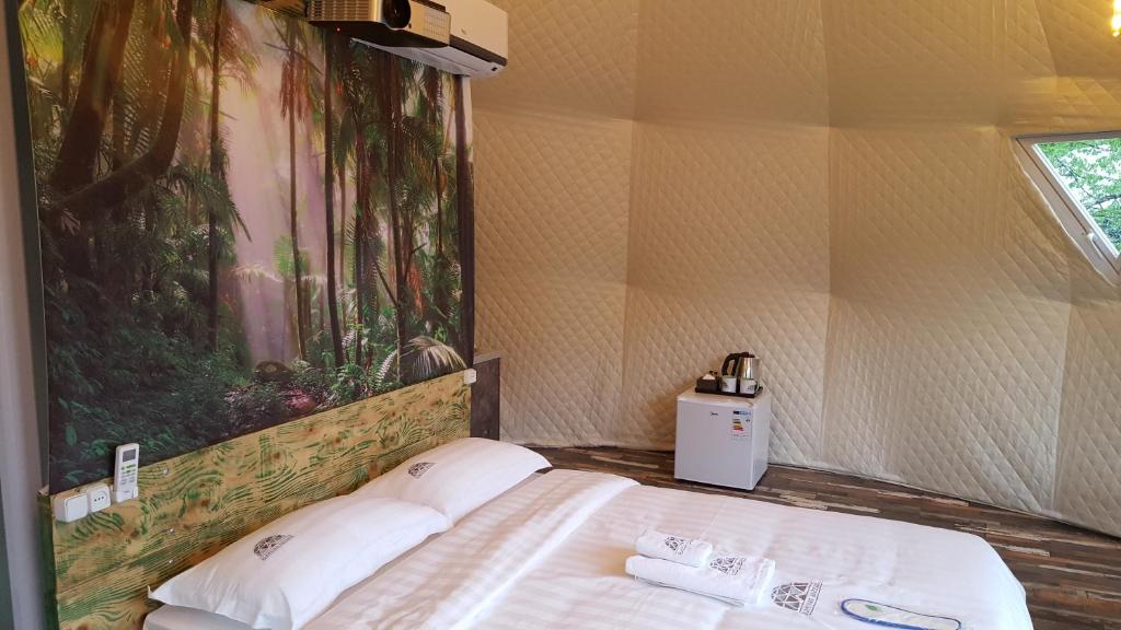 Postel nebo postele na pokoji v ubytování Glamping Georgia Krikhi