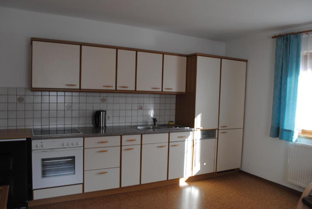 Kuchyň nebo kuchyňský kout v ubytování Apartment Maierhof