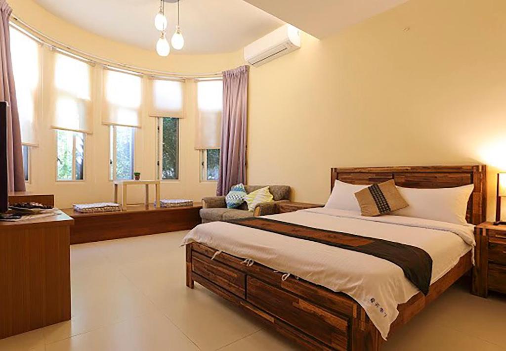 Postel nebo postele na pokoji v ubytování Summertimeph Homestay