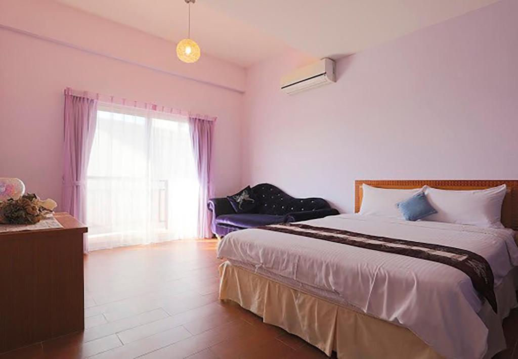 Postel nebo postele na pokoji v ubytování Summertimeph Homestay