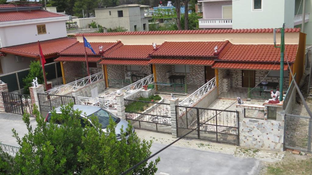 an overhead view of a house with red roofs at Villas Apartments SHAHAJ in Vlorë