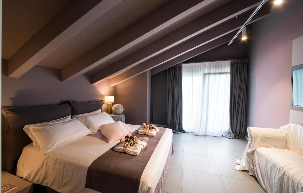 Postel nebo postele na pokoji v ubytování Art B&B Design