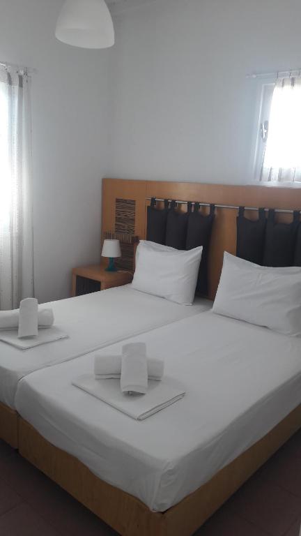 Postel nebo postele na pokoji v ubytování Chaniotis Studios