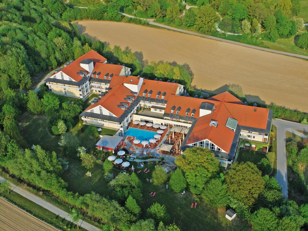 an aerial view of a house with an orange roof at Hotel St. Wolfgang in Bad Griesbach