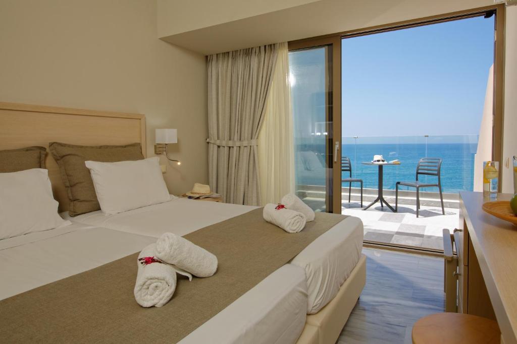 Posteľ alebo postele v izbe v ubytovaní Archipelagos Hotel