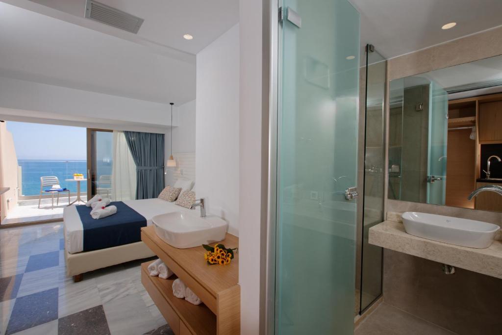 Posteľ alebo postele v izbe v ubytovaní Archipelagos Hotel
