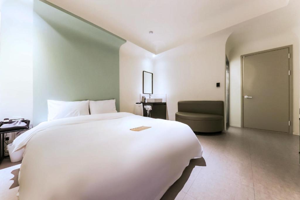 Postel nebo postele na pokoji v ubytování Hotel Yam