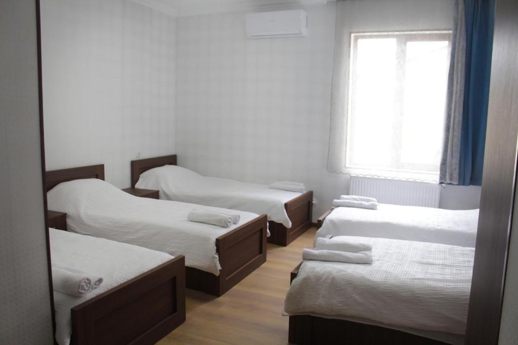 Llit o llits en una habitació de Bagration