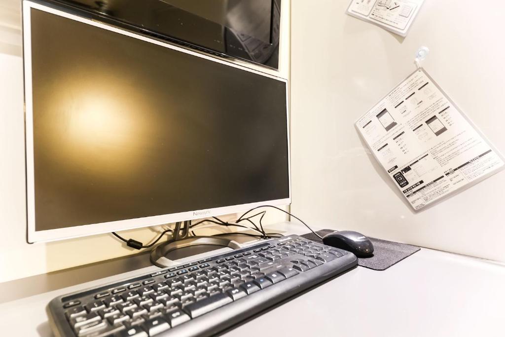 TV a/nebo společenská místnost v ubytování Hotel Yam