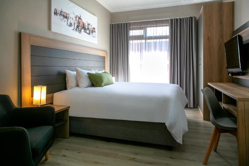 Posteľ alebo postele v izbe v ubytovaní Hotel AT Hatfield Apartments