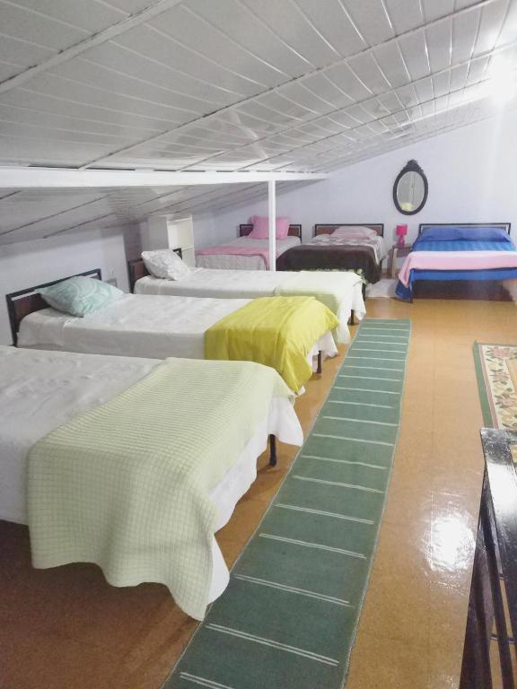 Postel nebo postele na pokoji v ubytování Refugio do Rei