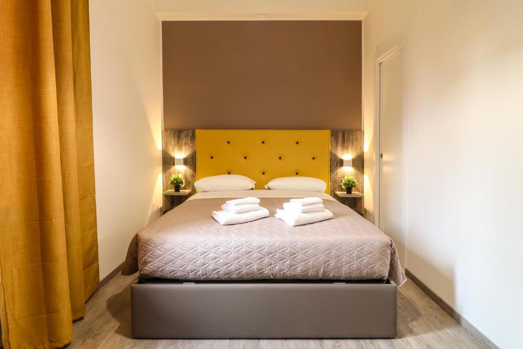 A bed or beds in a room at BorgoNove