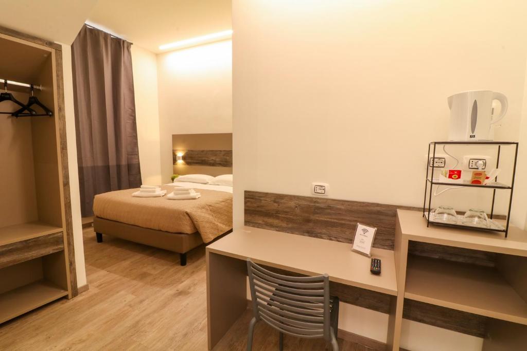 A bed or beds in a room at BorgoNove