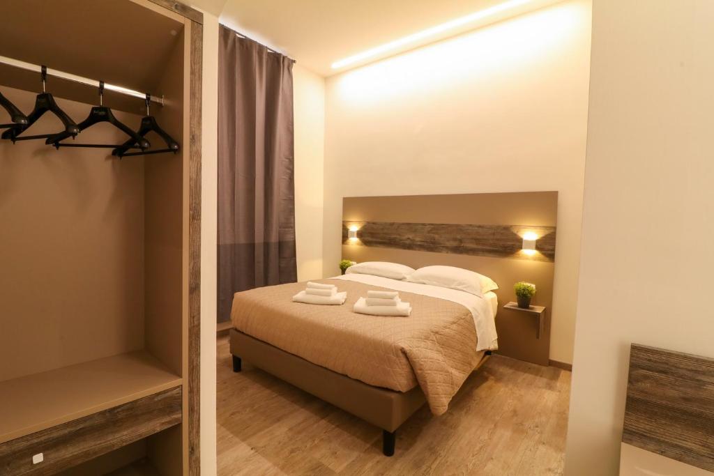 A bed or beds in a room at BorgoNove