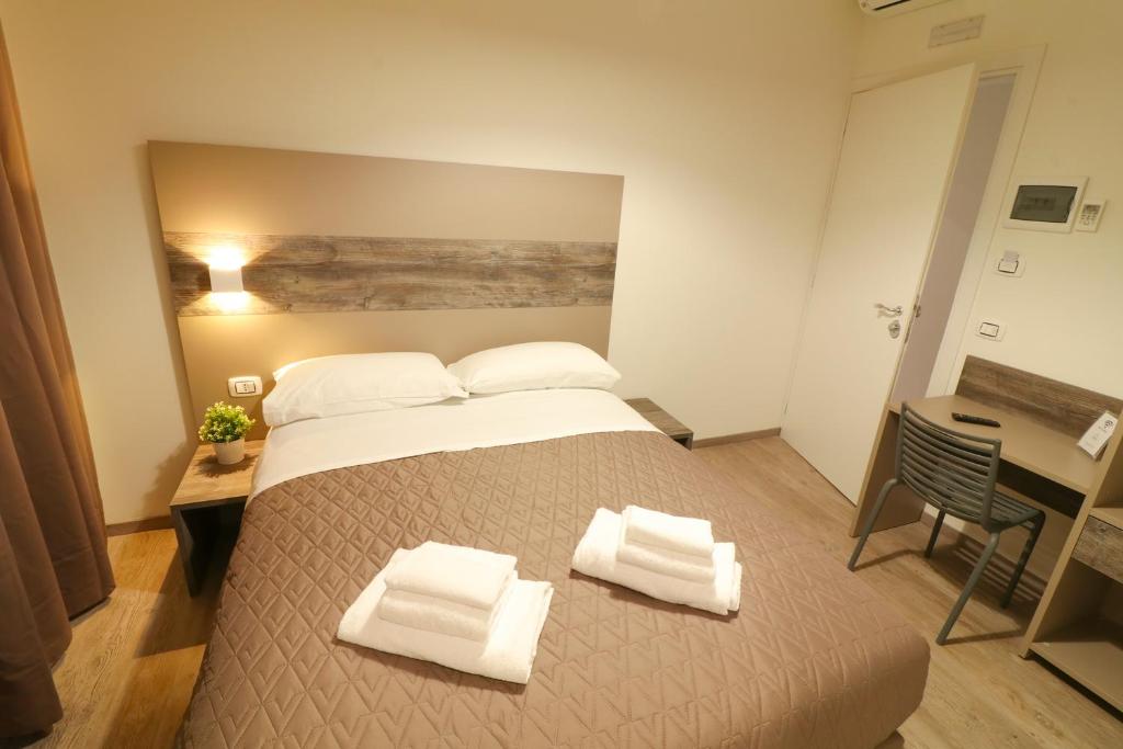 A bed or beds in a room at BorgoNove