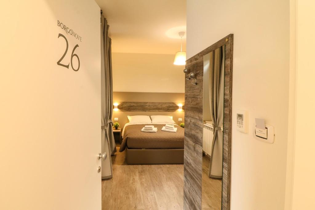 A bed or beds in a room at BorgoNove