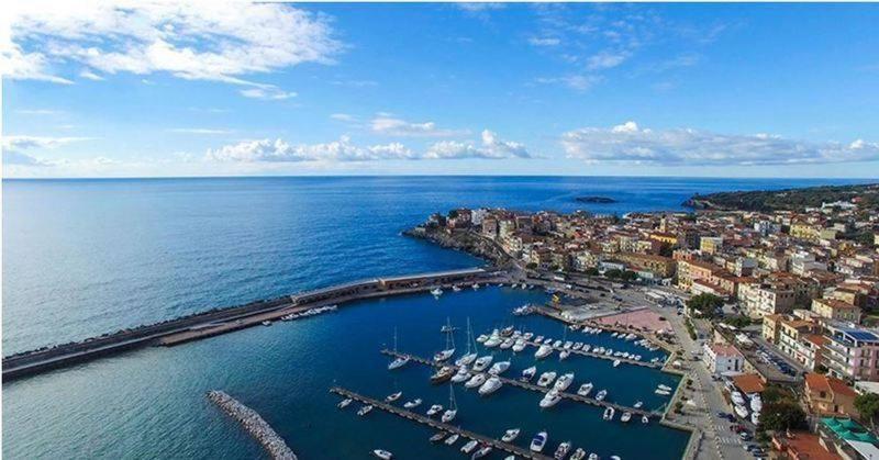 an aerial view of a harbor with boats in the water at Residence Eden in Marina di Camerota