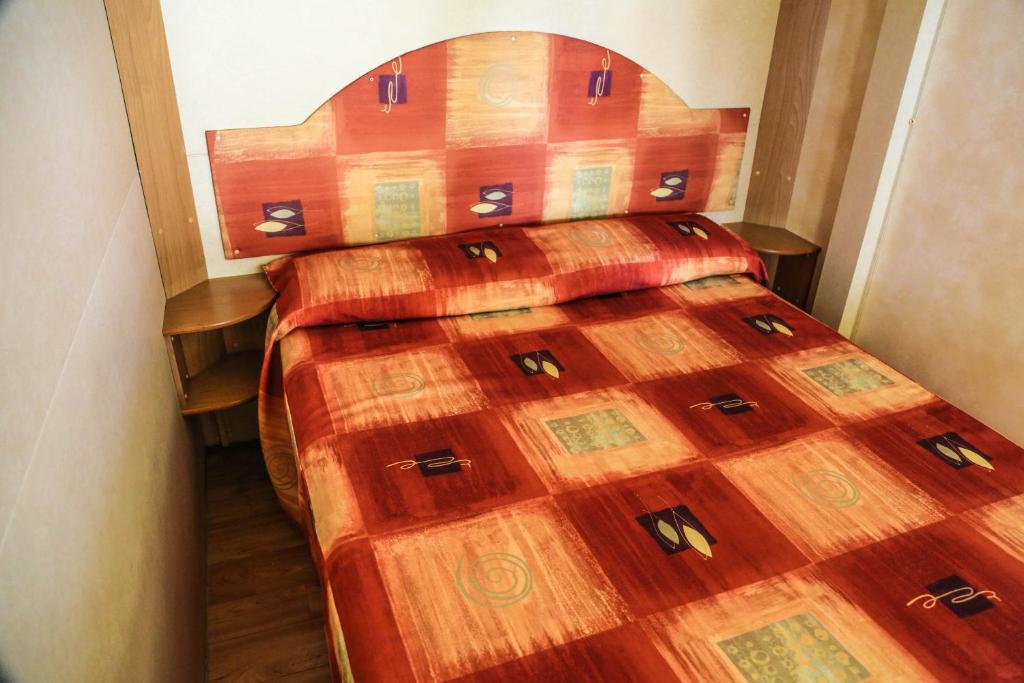 Postel nebo postele na pokoji v ubytování Camping Liana