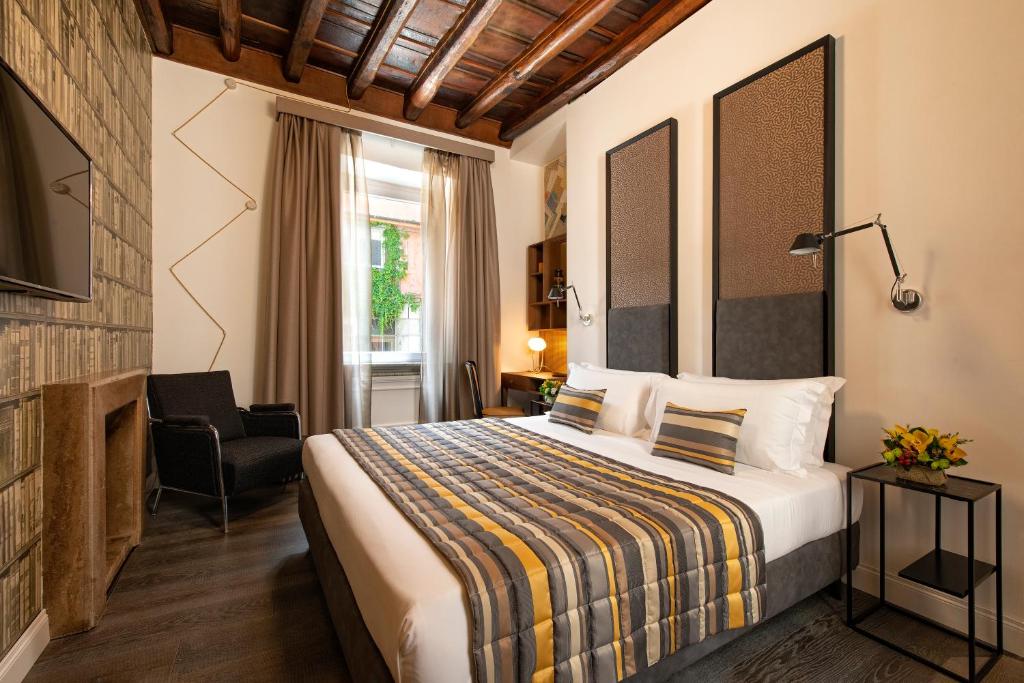 Postel nebo postele na pokoji v ubytování Maison Evelina