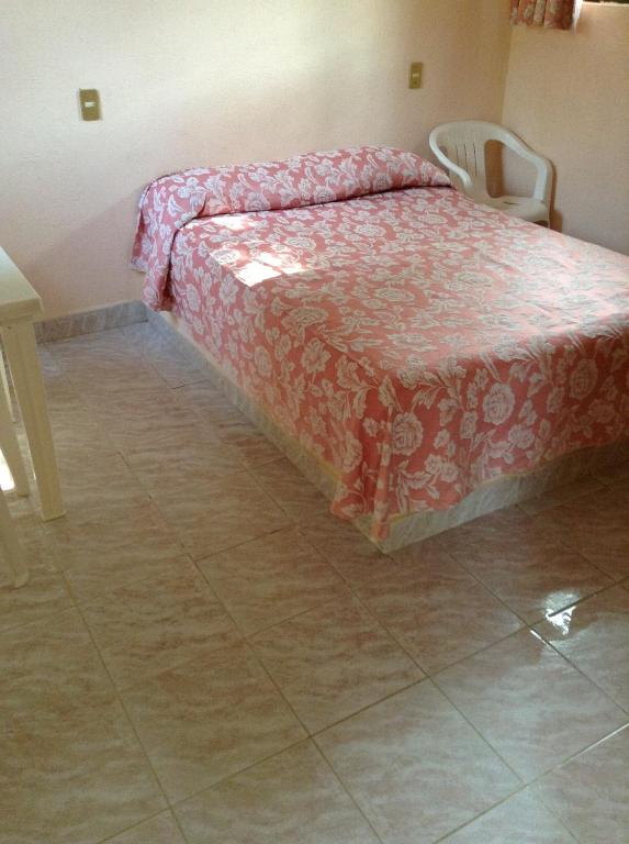 Postel nebo postele na pokoji v ubytování Hotel Tecozautla